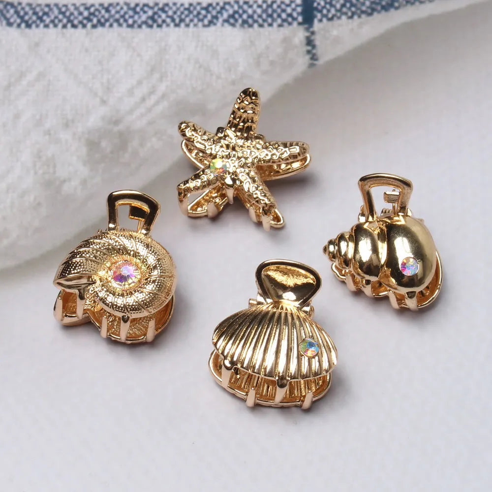 ✨🐚 Set de 4 Pinzas Mini para el Pelo – Colección Marina Dorada 🐚✨