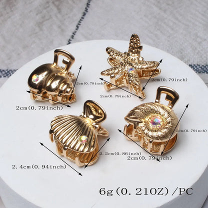 Set de 4 pinzas doradas marineras