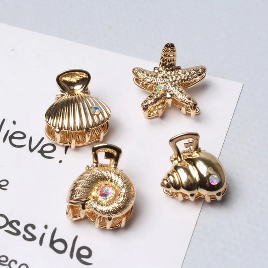 ✨🐚 Set de 4 Pinzas Mini para el Pelo – Colección Marina Dorada 🐚✨